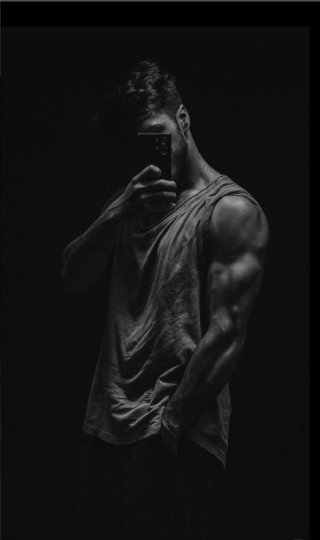 Cinematic Black and White Muscular Portrait with Dramatic Studio Lighting AI Prompt Original